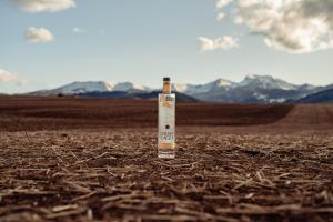 A bottle of Golden Eagle Vodka in the fields of Big Sky, Montana.