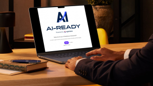 A Laptop showing the AI-Ready Assessment home screen.