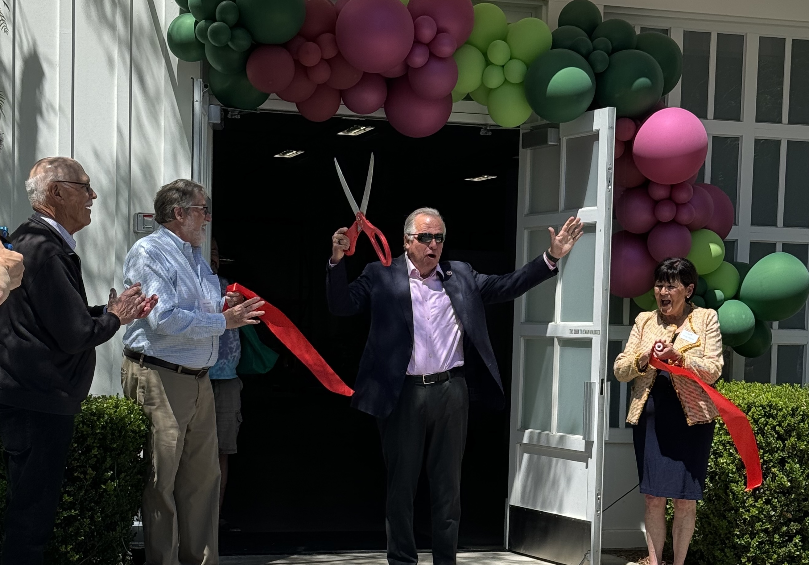 Senator Bill Dodd cutting ribbon of new CANV Food Bank