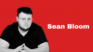 Sean Bloom in front of red background
