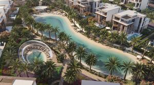 Swimmable lagoon and wave pool in the midst of villas at Nad Al Sheba Gardens