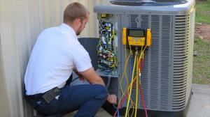 HVAC technicians from Done Rite Services installing a variable speed AC.
