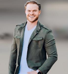 Photo of Robby Dameron standing in an outdoor setting