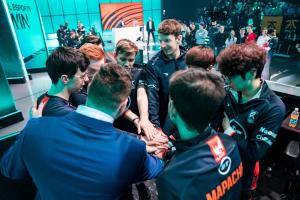 Esports athletes having a team huddle at an esports event