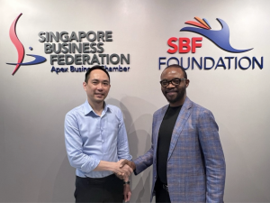 Photo: Chekinah Olivier, founder and CEO of OLC Project Management, with Ray Kwan, Director of the International Business Division Singapore Business Federation