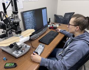 The Prefix quality team uses powerful microscopes and analysis tools for inspecting painted parts.