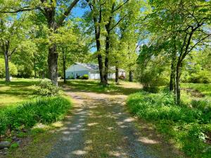 4BR/2.5BA home with a basement on 7.46± acres, an attached 500± sf. garage and a pole barn/shed (approx. 22'x36') in the sought after Nokesville/Brentsville School District of Prince William County VA