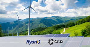 This is a photograph of solar panels with the Ryan logo and Crux logo on top