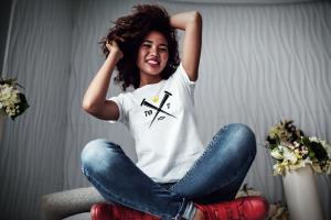 70x7 Lifestyle Image Girl Sitting on Bed