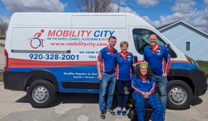 Photo of the Mobility City of Appleton owners and Technicians along with a van