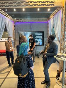 Demos and discussion at the 5G Mökki stand at JCI Europe Oulu.