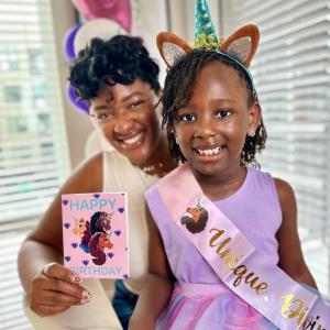 Mother & Daughter Enjoy Hustle & Hope’s Afro Unicorn Greeting Cards