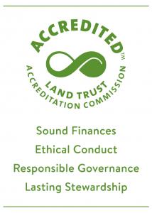 Green infinity swirl surrounded by the text Accredited - Land Trust Accreditation Commission and 4 bullets: Sound Finance, Ethical Conduct, Responsible Governance, Lasting Stewardship