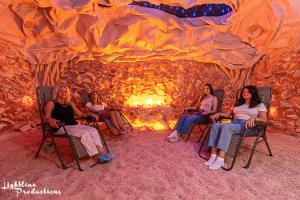 A salt cave is a serene, dimly lit space adorned with natural salt crystals, ambient lighting, and ethereal sounds, offering a tranquil environment infused with health-promoting salt particles for relaxation and rejuvenation.
