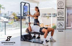 Image of man and women using home fitness equipement