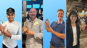 4 employees holding the Pacesetter award