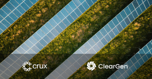 This is a color photograph of solar panels with the Crux and ClearGen logos on the bottom of the image