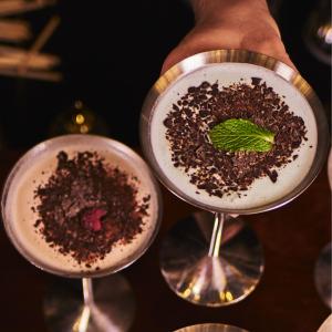 Assorted chocolate martinis including Strawberry, Hazelnut, Raspberry, and Espresso varieties, known for their rich flavors and indulgent taste.
