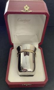Large sterling silver cup by Cartier in the original box, in like-new condition and inscribed with the initials “J.B.H.” (est. 300-$450).