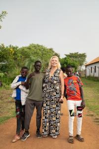Hazel Ortega, through her High Tide Global Foundation, has made notable contributions to global well-being by building a school and a medical center in Uganda, and providing drinking water to the Gulu community to improve living conditions and sustainable development.