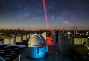Optical telescope beaming a laser into space