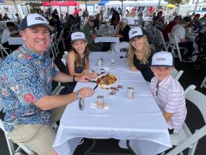 Newport Beach Mayor Will O'Neill, wife Jenny, and children enjoy the pancake breakfast on July 4th.