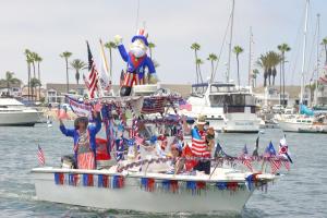  The day also featured a boat parade with Mayor Will O’Neill as Grand Marshal, with the theme “Stars, Stripes, and Sails.”