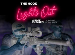 A neon-pink "Lights Out" logo accompanies two friends hunting with thermal optics in the dark