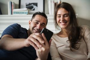 Couple Using PAIRS Yodi Relationship Coach App