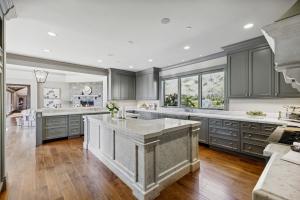 Gourmet kitchen with Carrara marble island, custom cabinetry, and high-end appliances