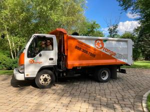 orange crew junk removal truck