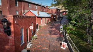 Historic brick buildings line Reeder's Alley.