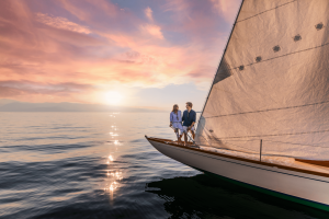 A couple enjoys a sailing excursion on Flathead Lake.