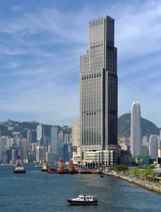 Hong Kong skyline with tall buildings and Victoria Harbour, highlighting the city as a central location for the Digital Visionaries Symposium 2024