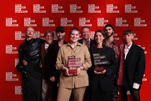 Image of last year's (2023) joint overall winners Tamar Elbaz of Shenkar College, Israel and Ana Del Rio Mullarkey of De Montfort University, UK with judges in front of a Real Leather. Stay Different. photo wall