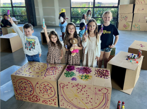 kids decorating boxes