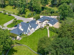 38-48 Quaker Lane includes a large home & world-class equestrian amenities on over 11 acres