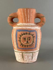 There are two ceramics by Pablo Picasso (Spanish, 1881-1973) for Madoura. One is this baluster form vase titled Décor Pastel (1953), numbered “22/200” (est. $8,000-$12,000).