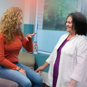 Provider,  Rebecca Kreiner, APRN, FNP, discusses patient concerns at MedStudio's Minnetonka location.