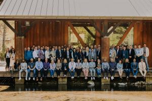 Group photo of the 2024 Eltropy Leadership Summit, where C-Suite executives and industry experts explored credit union and community banks’ evolving role in community support, fraud prevention, and responsible AI implementation