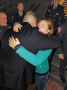 Tiffany Oliverio hugs one of the first responders who saved her life (Tri-County Times)