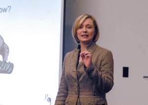 Sharla J. Frost standing on stage