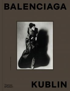 Image of the book, Balenciaga-Kublin: A Fashion Record, Courtesy of Thames & Hudson. Black and white photo of a lady on a book cover wearing a voluminous floor length coat