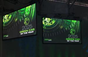 2025 Green Car of the Year logo shown on two display screens.