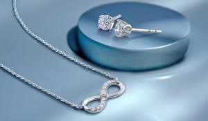 Infinity pendant necklace & diamond stud earrings as free gifts by With Clarity