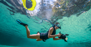 Kimber Greenwood from Waterbear Photography uses a BLU3 battery-powered dive system for underwater photography, capturing marine life and underwater environments. The lightweight BLU3 system allows for easy mobility and extended diving sessions, making it