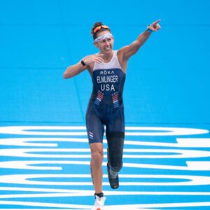 woman athlete with prosthetic celebrating