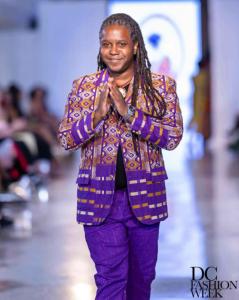 Designer Maurice Gattis for Fort Mose 1738 takes a bow after showing Spring 2025 collection at DC Fashion Week