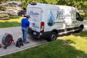 J. Blanton Plumbing technician working on a sewer line maintenance job, showcasing the company's expertise in Elgin sewer line maintenance, trenchless sewer repair, and emergency plumbing services as part of their Elgin Area Chamber of Commerce membership