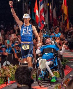 Brent and Kyle Pease cross the finish line of the 2018 IRONMAN World Championships in Kona